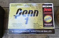 Top of sealed Penn 1 Championship tennis ball box showing 16 cans/48 balls specification
