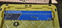 sealed blue Power Fist box on yellow surface