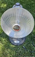 Front view showing complete Presto HeatDish heater with reflector and base