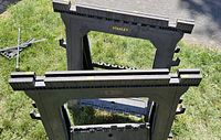 Top view of both Stanley folding sawhorses standing open on grass