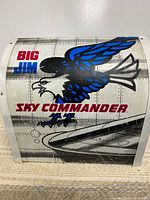 Exterior with eagle graphic and Sky Commander text