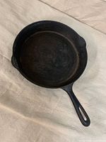 Top view of seasoned cast-iron skillet