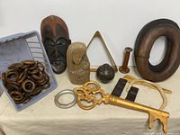 Overall lot with assorted carved wood items, pool triangle, decorative key, basket of curtain rings