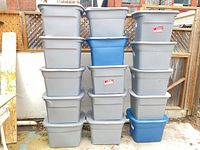 Stack of 17 Sterilite bins outside, showing colour mix and quantity