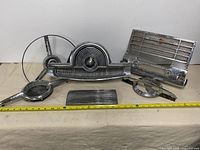 All six chrome parts laid out for overview