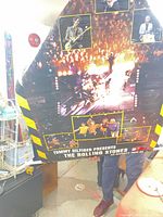 Front view of the poster showing full collage and sponsor text