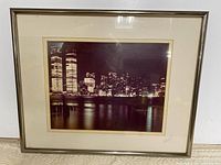 Front view of matted photograph in metal frame