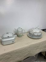 All three main items arranged: West Germany tureen, Toscany coffee pot, Poland tureen set