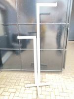 Full view of rack showing two heights and cross base