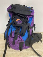 Front view of Lowe Alpine Sundancer backpack showing logo and overall condition