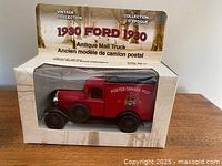 Front view of boxed die-cast 1930 Ford Canada Post mail truck