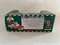 Side panel of box with series information and artwork