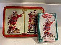 Tin and sealed deck front view