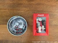 Both ornaments side by side, bottle-cap and boxed polar bear