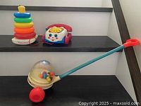 Overview of all three Fisher-Price toys