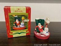 Ornament beside original box, full view