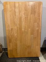 table top showing wood grain and rounded edges