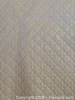 Close view of quilted vinyl surface