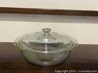 Bowl with lid in place, side view