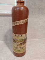 Full view of 11-inch ceramic Havemeyer wine bottle with labels