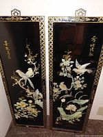 Full view of both lacquer panels standing side by side