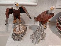 Front view of both eagle figurines