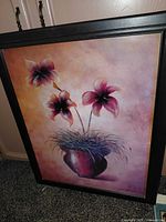 Front view of framed flower painting