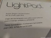 Box close-up showing LightPad branding and LED light box description