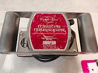 Top view showing red control panel with Morfam branding and variable speed label