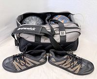 Overall lot showing Brunswick double roller bag with two balls inside and Dexter shoes