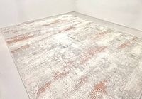 Full view of rug showing abstract ivory, gray, terracotta pattern