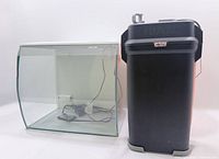 Fluval Flex aquarium beside Fluval 407 filter