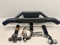 Go Rhino hitch step and three ball mounts grouped