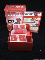 Closed box front and opened interior showing sealed decks