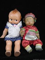 Both dolls front view showing size and attire