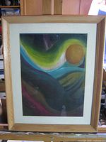 Front view of framed abstract painting