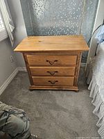 Front view of solid pine 3-drawer table showing drawer pulls and rope detail