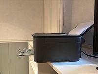 Left side view of Canon Pixma printer with output tray extended