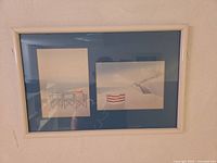Front view of framed dual beach print
