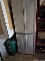 Exterior of tall plastic cabinet with closed double doors