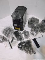 Main view of pasta maker and bagged accessories