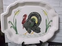 Front view showing turkey design and rope border