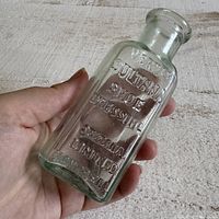 Front view showing embossed text