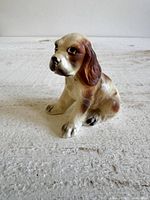 front three-quarter view of ceramic dog shaker