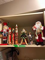Full shelf view showing all Christmas figures