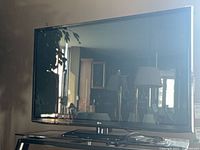 Front view of LG plasma TV on stand