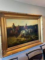 Full view of framed painting on wall