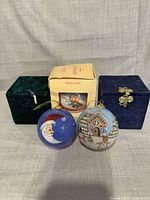 all three ornaments and three boxes displayed