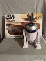 Boxed Mandalorian Razor Crest & Sandcrawler set with loose R2-D2 figure front view