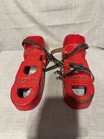 Top view of both Weider cast iron shoes showing logos, straps and overall wear
